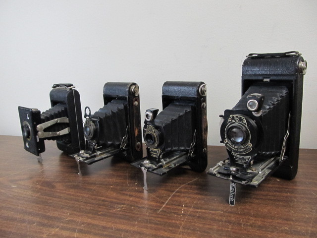 lot 127 image: NICE Group of 4 Antique Folding Bellows Cameras