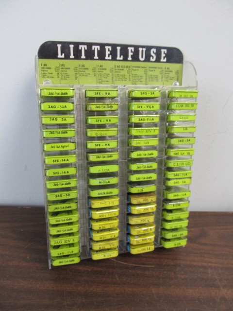 lot 128 image: Vintage Littelfuse Display Rack wEmpty Fuse tins