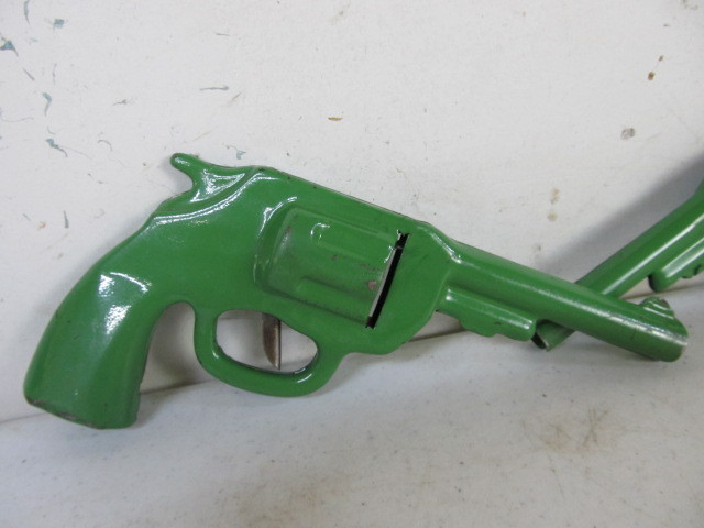 lot 173 image: Matching Pair of Vintage Green Metal Pop Guns