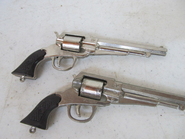 lot 181 image: Lot of Vintage Toy Cap Guns & Holsters