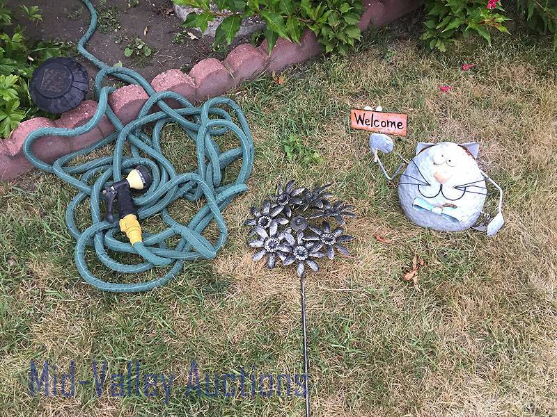 Garden hose & lawn art