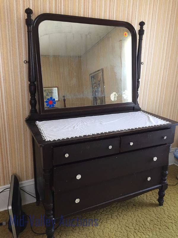 Vintage dresser with swivel mirror with doilies