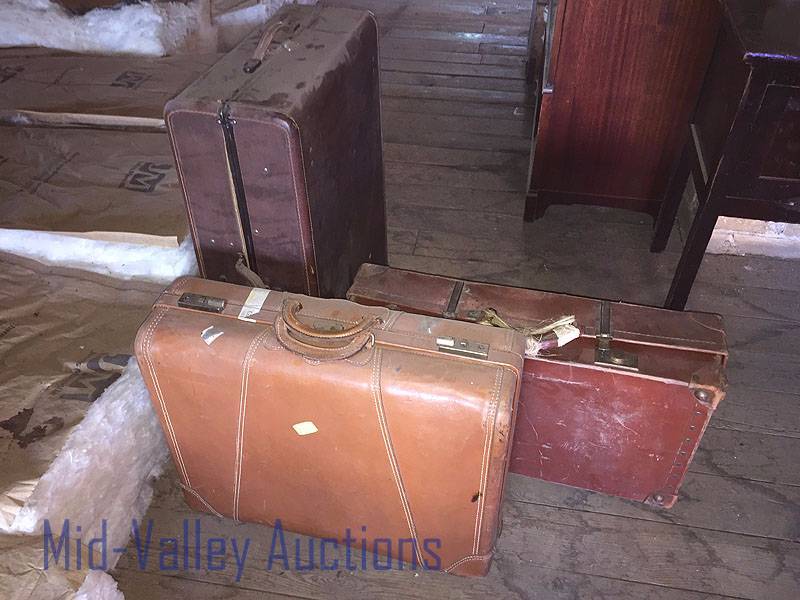 3 old suitcases