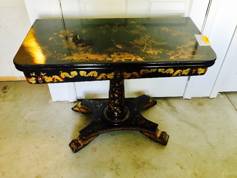 lot 8 image: ANTIQUE BLACK GAME TABLE