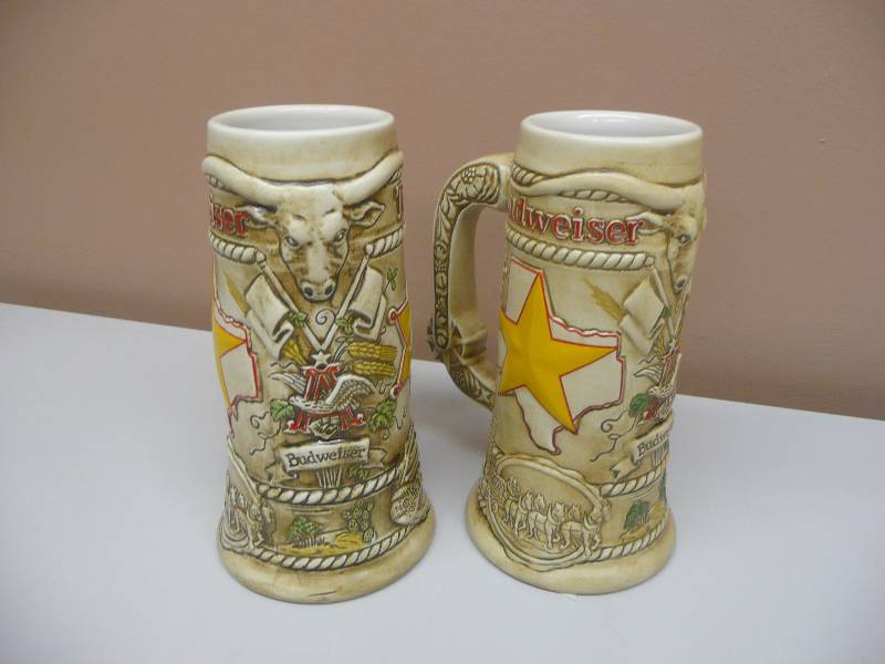 lot 26 image: (2) BUDWEISER LIMITED EDITION TEXAS LONE STAR BEER STEIN WESTERN SPUR - 1983 - SEE PICTURES