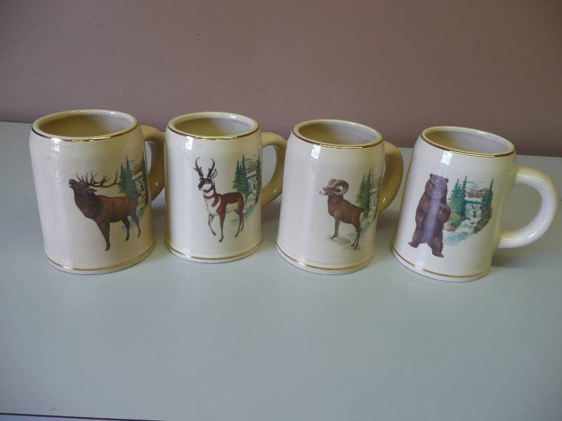 lot 53 image: VINTAGE LIMITED EDITION Set 4 Olympia American Wildlife Series Steins - VERY COOL SERIES - SEE PICTURES