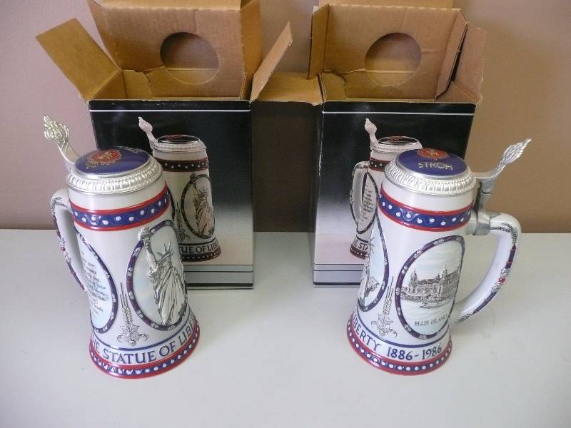 lot 61 image: (2) - VINTAGE -Stroh Beer Stein Lidded Statue Of Liberty 1886-1986 NEW WBOX - SEE PICTURES