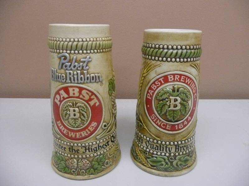 lot 84 image: (2) VINTAGE PABST BLUE RIBBON BEER STEINS - GREAT CONDITION SEE PICTURES