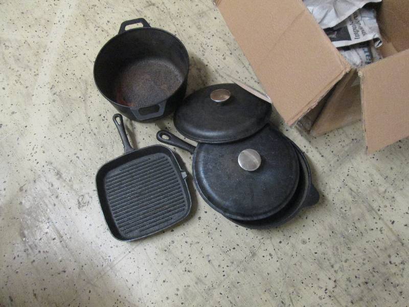 lot 15 image: 5-Piece Cast Iron Cookware Set open...