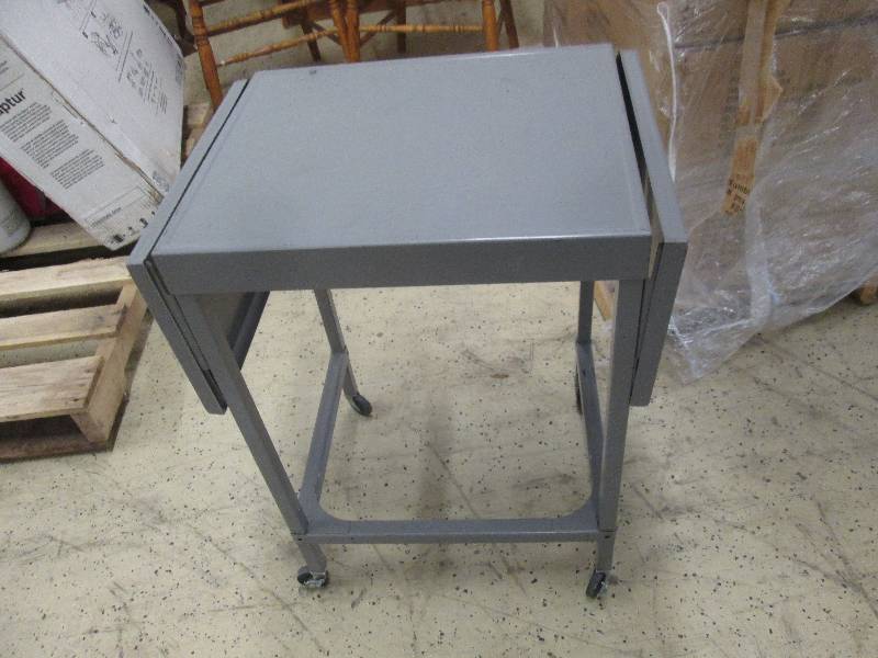 lot 73 image: Rolling Metal Drop Leaf Table...