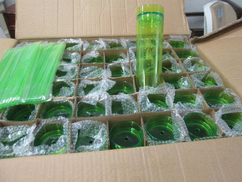 lot 79 image: Case of 48 Tall Transparent Lime Co...