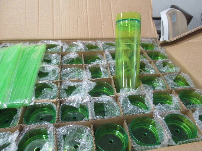 lot 84 image: Case of 48 Tall Transparent Lime Co...