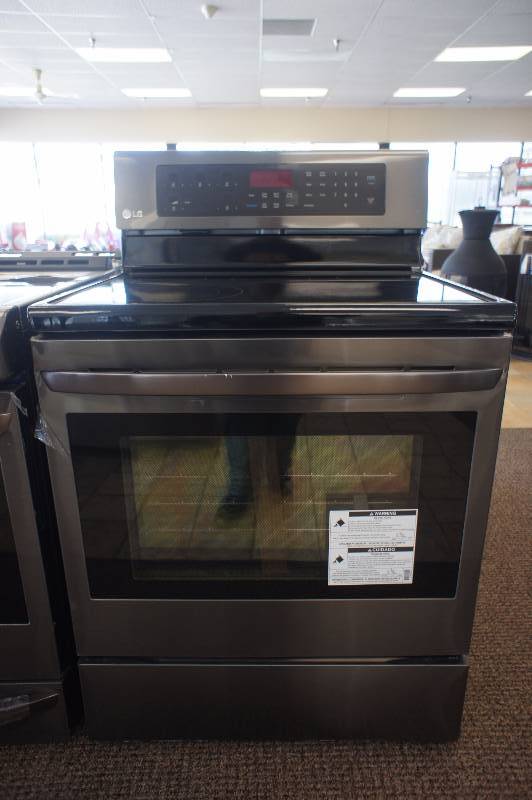 lot 10 image: New - Scratch & Dent LG Model # (LRE3083BD) - 6.3 cu. ft. Free-Standing Electric Range - Black Stainless Steel -Tested Works - MSRP $ 1699.99
