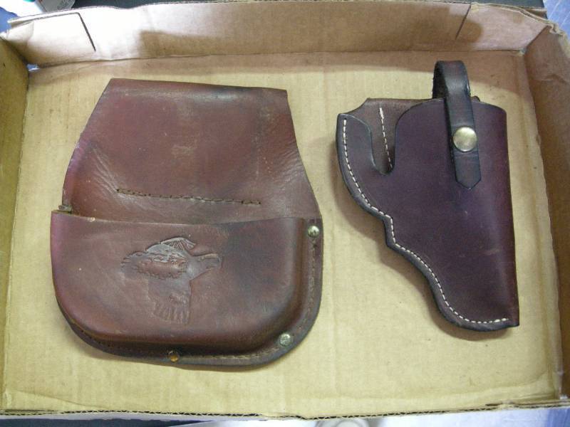 lot 67 image: Leather Pistol and Rifle Holsters