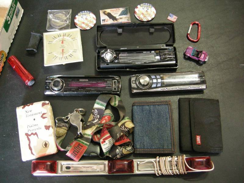 lot 73 image: Car Stereo Fronts, Billfolds, Gadgets
