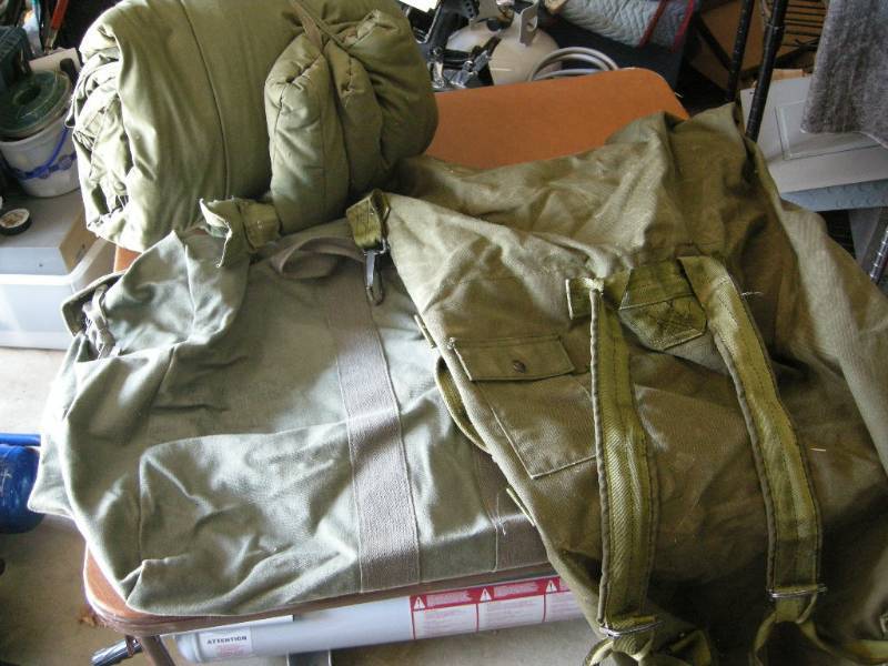 lot 93 image: Military Duffels and Sleeping Bag