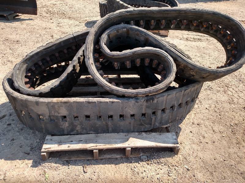 lot 17 image: (3) Skid Loader Tracks...