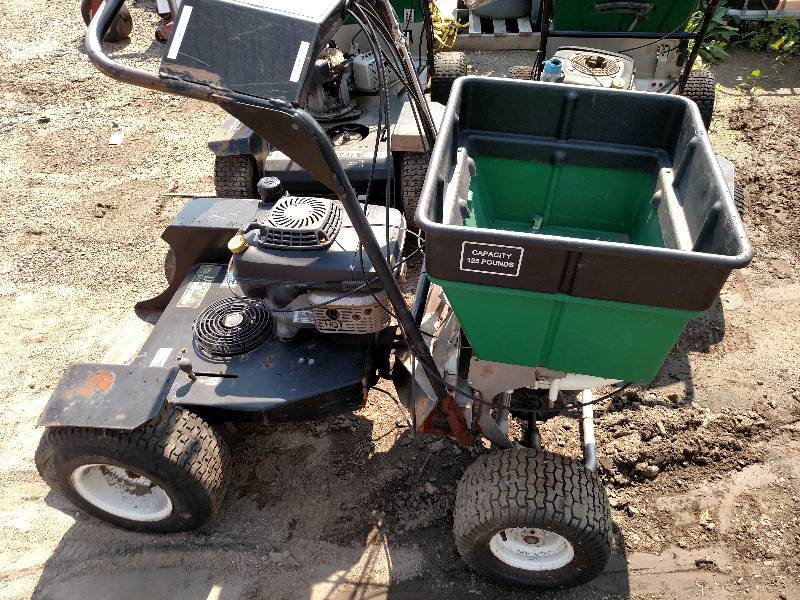 lot 30 image: (3) Lesco Ride-On Spreaders, Parts ...