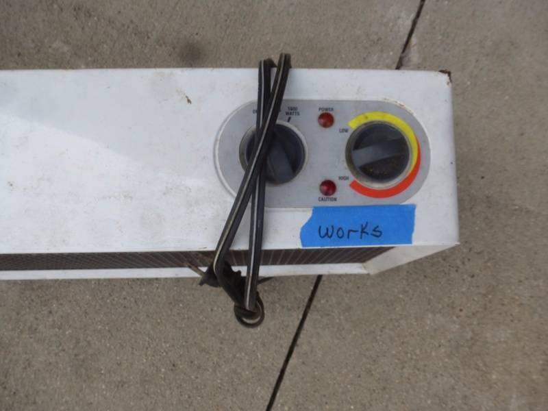 lot 30 image: Electric Base Board Heater & shell case