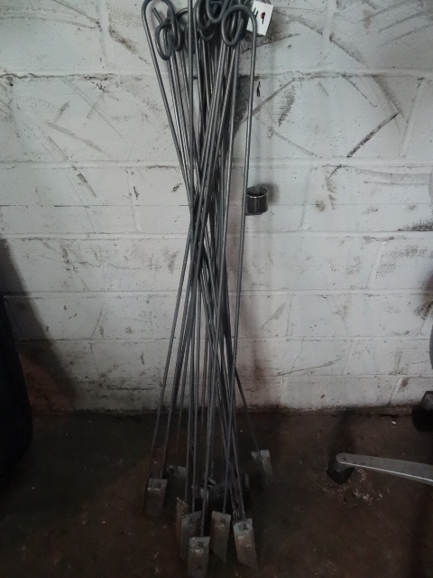 lot 49 image: 17 In Ground Stakes For Hanging Items.