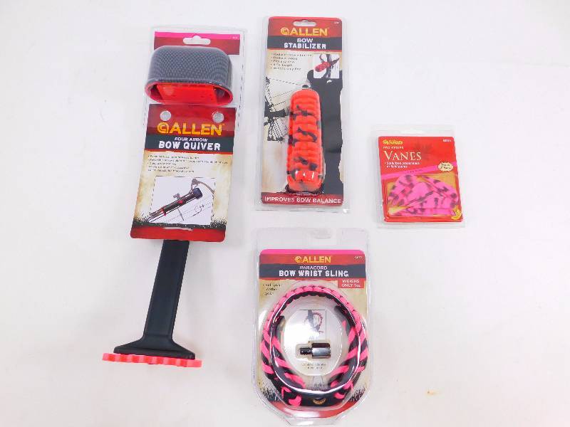 lot 1 image: New Bow Stabilizer, Wrist Sling, Quiver, and Vanes