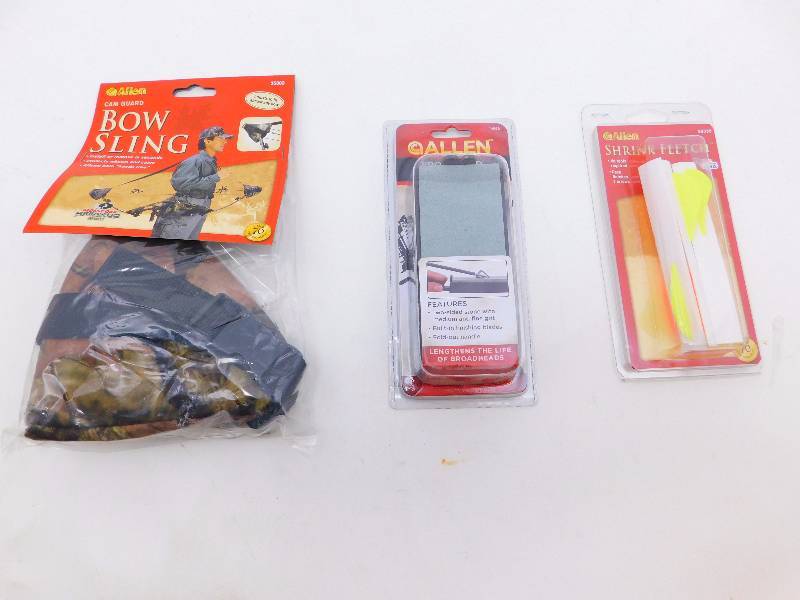 lot 23 image: New Archery Accessories Shrink Fletch, Broadhead Sharpener, Bow Sling