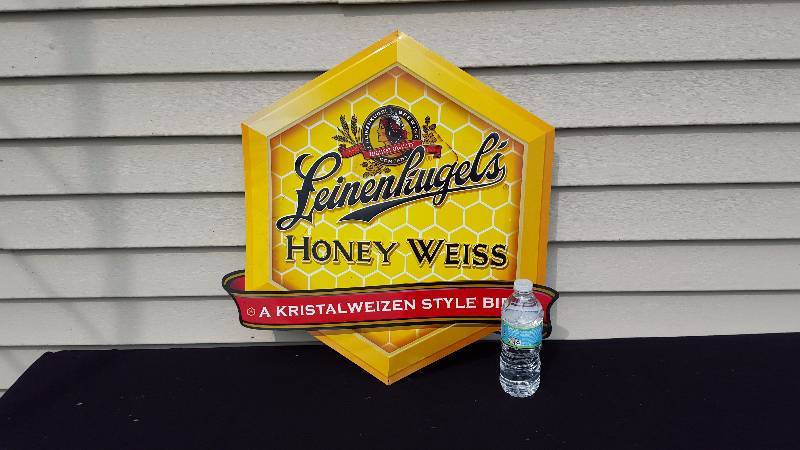 lot 35 image: Leinenkugels Honey Weiss Advertising Metal Sign