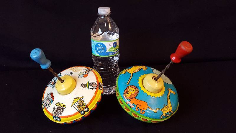 lot 147 image: (2) Tin Litho Spinning Tops