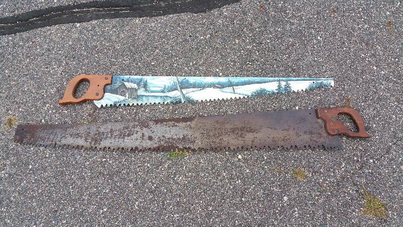 lot 104 image: Painted Antique Saw & E C Atkins Logging Saw
