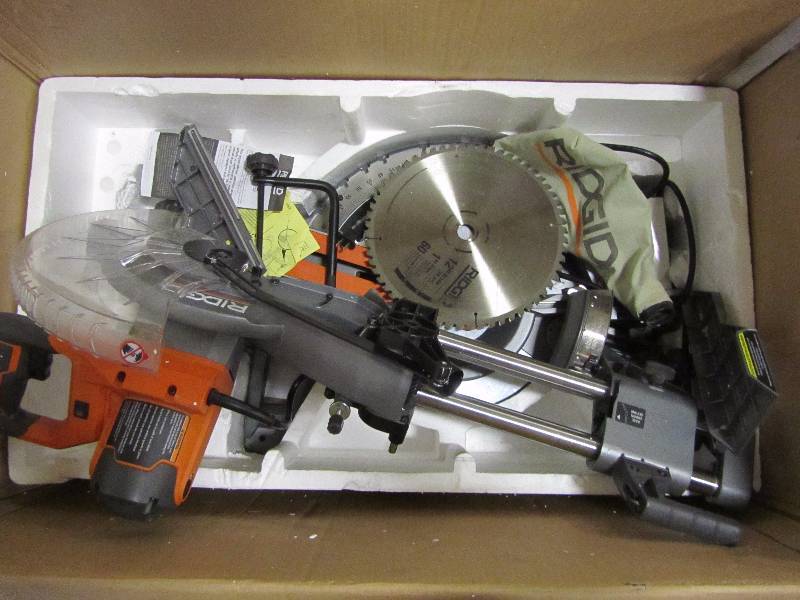 lot 9 image: RIDGID 15 Amp 12 in. Corded Dual Bevel Sliding Miter Saw with 70 Degree Miter Capacity
