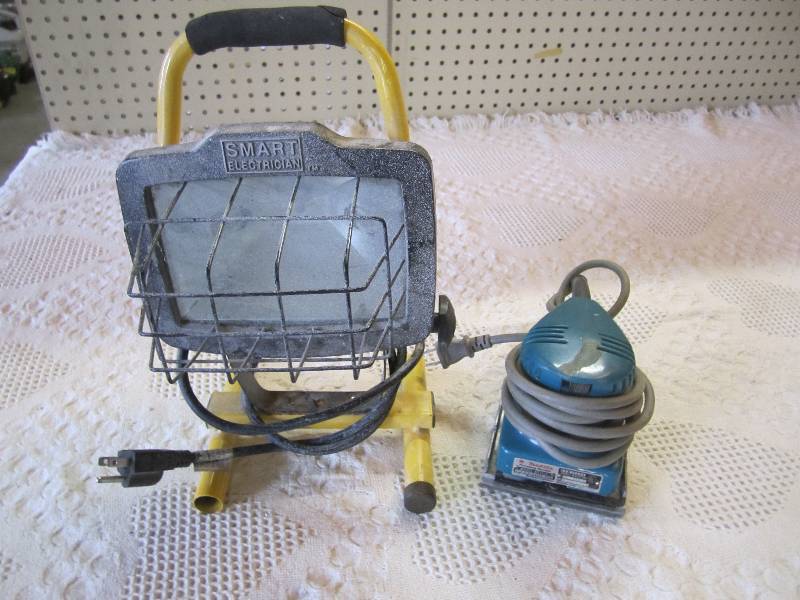 lot 62 image: Makita Palm Sander and Work Light S...