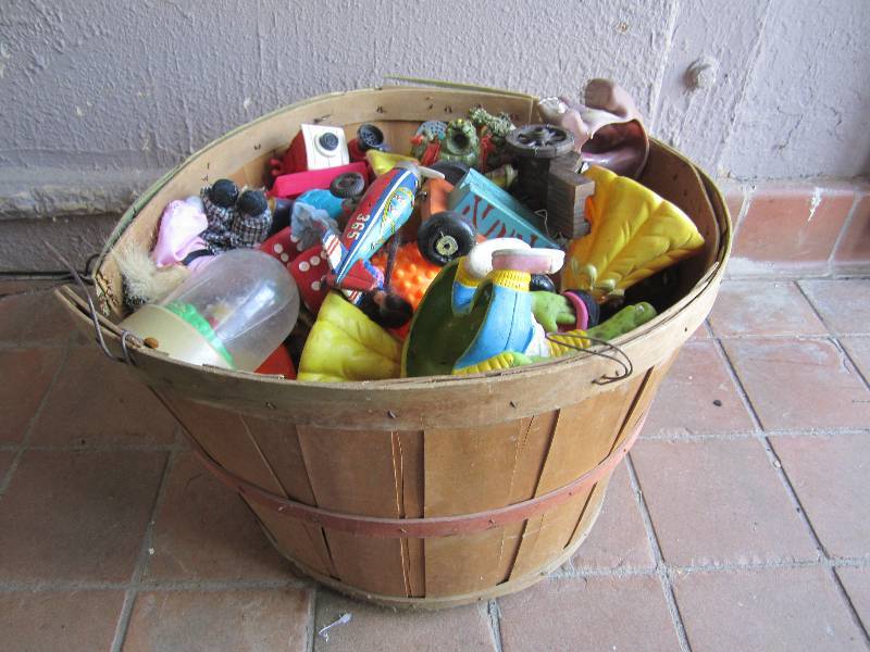 lot 205 image: Basket full of misc smaller toys. ...