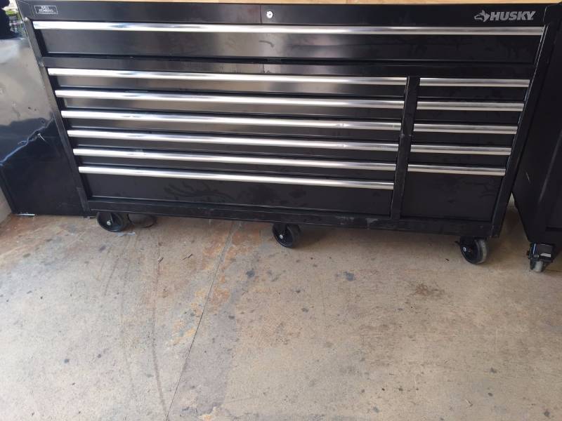 lot 163 image: Husky 66 in. W 24 in. D 12-Drawer Heavy-Duty Mobile Workbench, Black open box never used