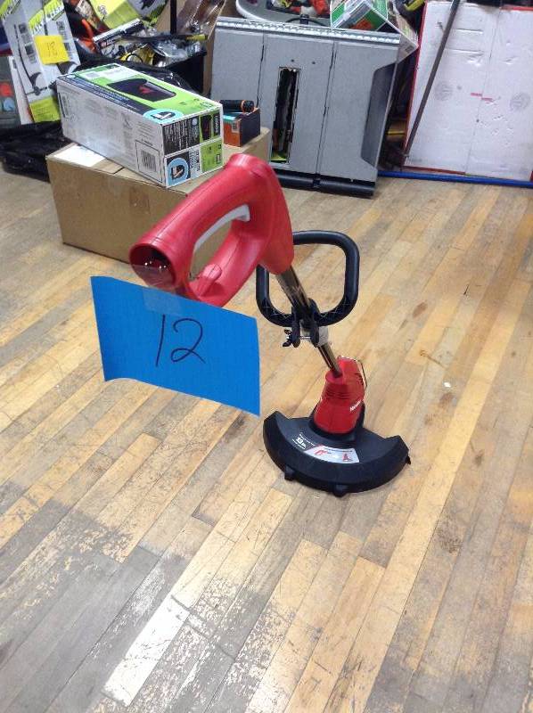 lot 12 image: Homelite Electric String Trimmer