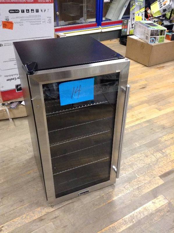 lot 14 image: Magic Chef 3.1 cu. ft. 87 (12 oz.) Can Cooler in Stainless Steel small dent and scratches present please review the pictures