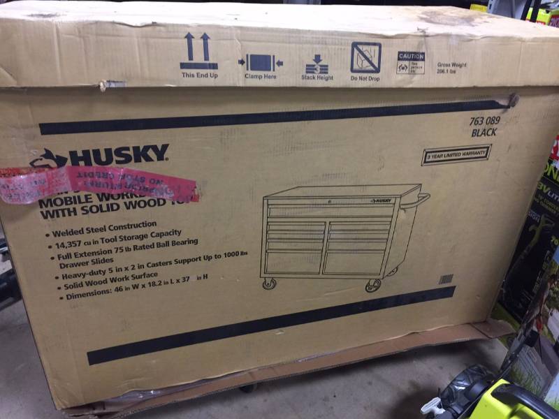 lot 153 image: Husky 46 in. 9-Drawer Mobile Workbench with Solid Wood Top, Black New