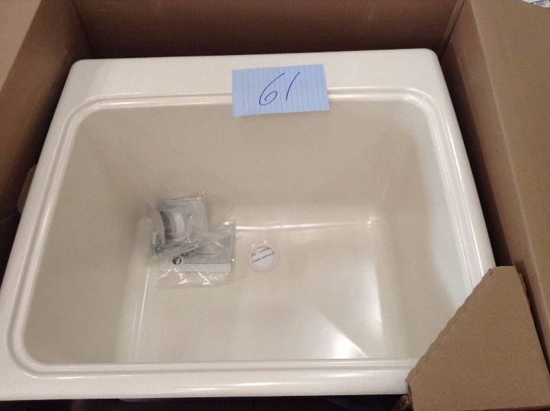 Swan 25 in. x 22 in. x 13-916 in. Solid Surface Utility Sink not used