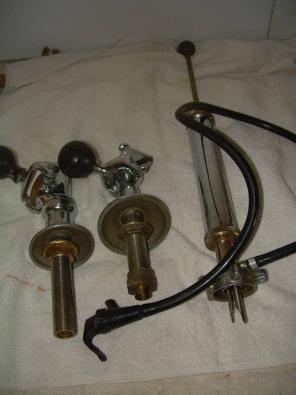 lot 65 image: COLLECTIBLE BEER TAPS AND KEG TAPPER