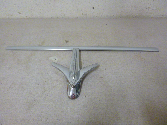 lot 28 image: 1951 Plymouth Hood Ornament