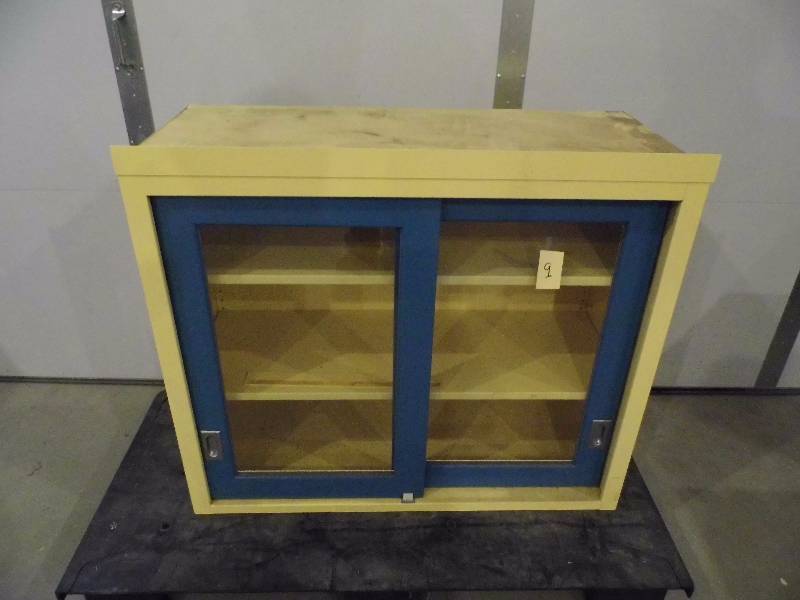 lot 9 image: Metal Cabinet w Sliding Doors