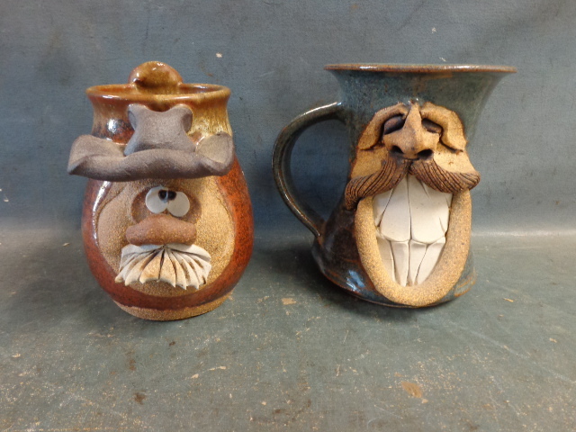 lot 194 image: Pottery Face Mugs