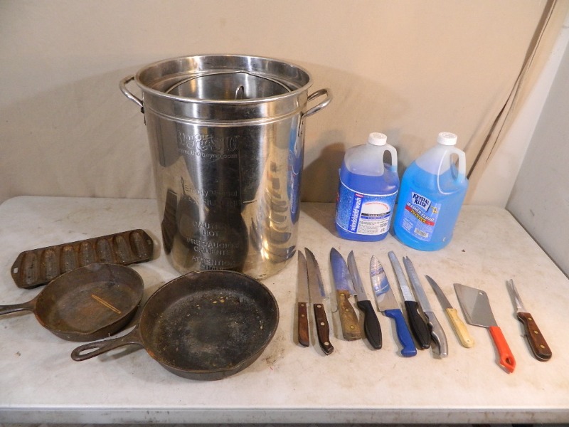 lot 148 image: Large Stainless Pot, Cast Iron Skillets, Washer Fluid, Etc