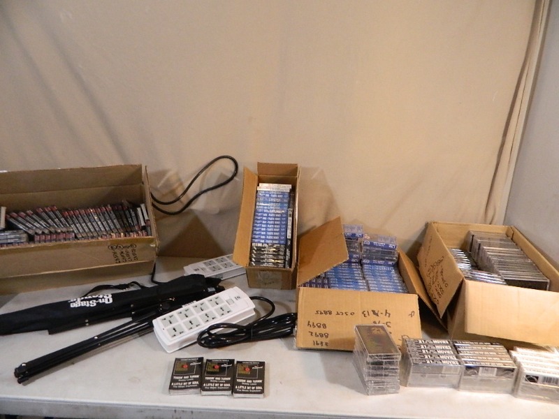 lot 179 image: New Cassette Tapes, Folding Music Stand, and European Powerstrips