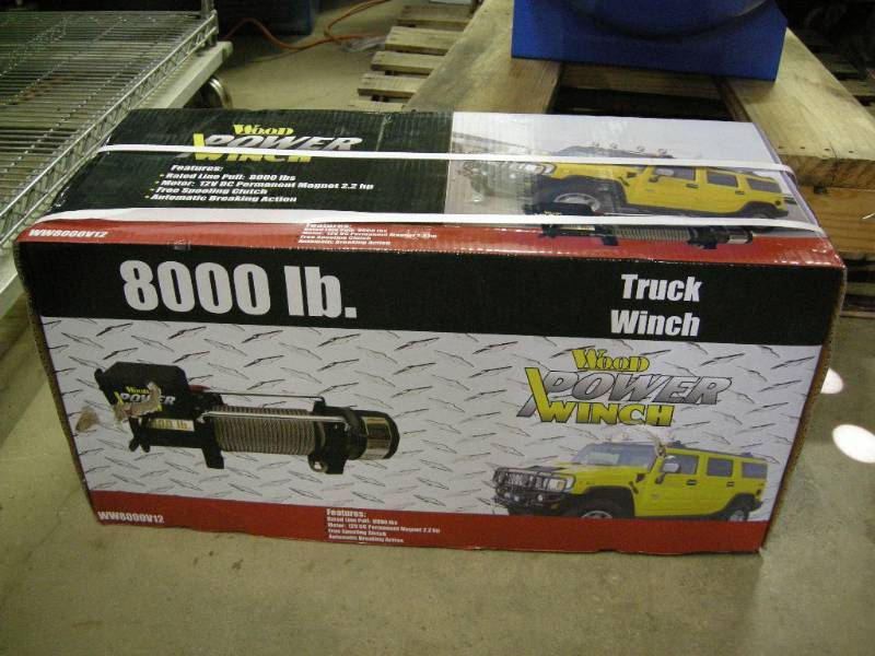 lot 17 image: 8000 lb Wood Power Truck Winch