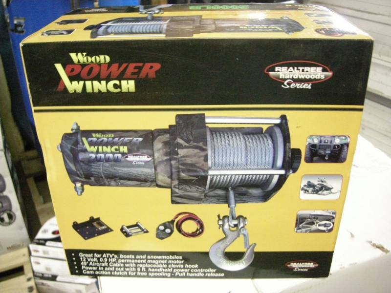 lot 63 image: 2000lb Wood Power Winch (Realtree series)