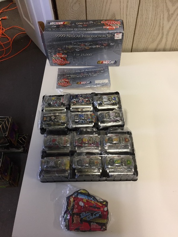 lot 72 image: Racing Champions 1999 Nascar Set 12 Silver Chrome Commemorative Cars