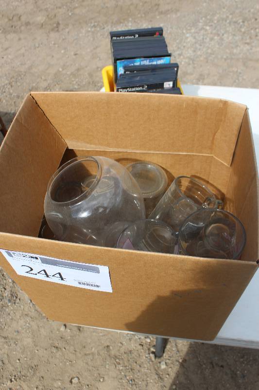lot 244 image: Beer & Pop Glasses w Decorations Includes Minnesota Gophers, Leinenkugels, Coca-Cola, A Christmas Story, And More