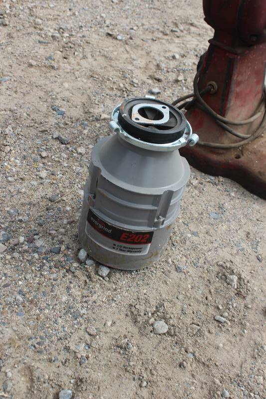 lot 182 image: Evergrind 12 hp Garbage Disposal