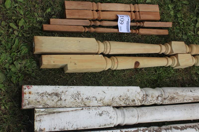 lot 107 image: Lot of (2) Green Treated Wood Pillars