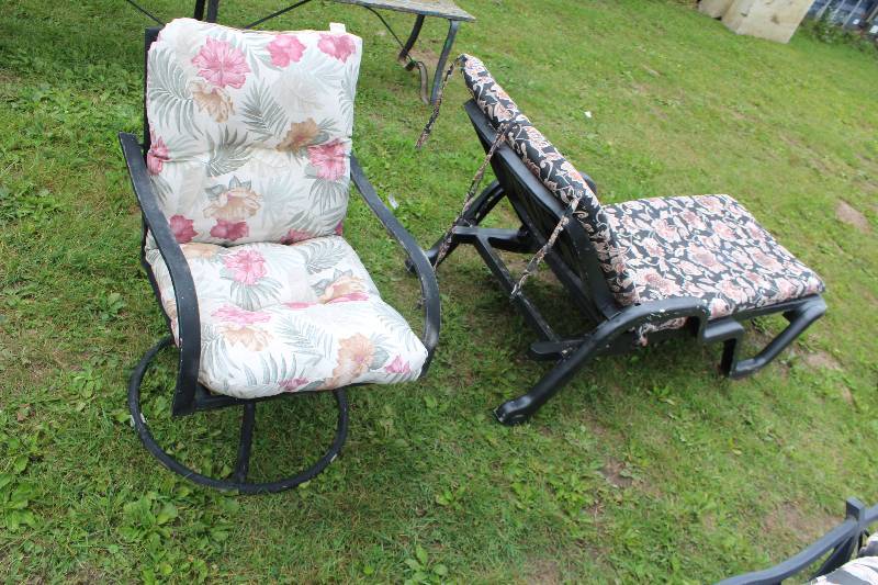 lot 79 image: Lot of (2) Patio Chairs w Cushions Includes 1-Swivel Chair, 1-Lounger Chair